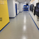 Epoxy-coated driveway with a flake finish for added texture and slip resistance.